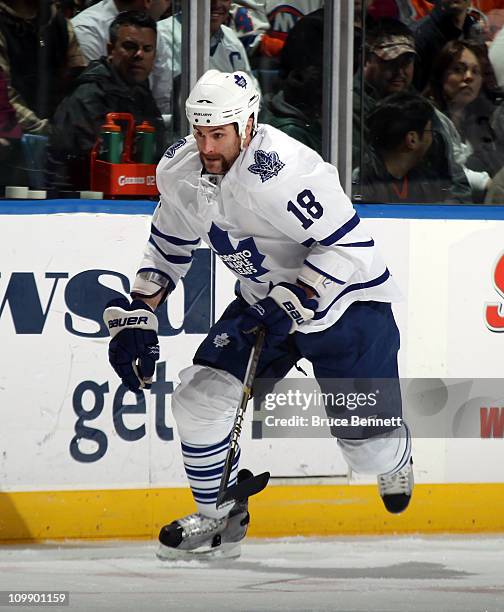 Mike Brown of the Toronto Maple Leafs skates against the New York Islanders at the Nassau Coliseum on March 8, 2011 in Uniondale, New York. The...
