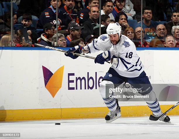 Mike Brown of the Toronto Maple Leafs skates against the New York Islanders at the Nassau Coliseum on March 8, 2011 in Uniondale, New York. The...