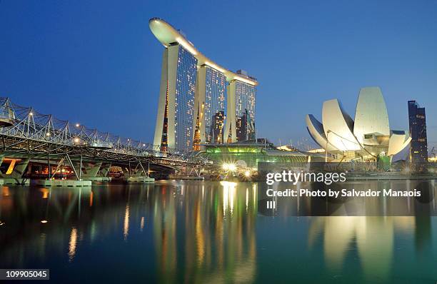 marina bay singapore: urban landscape - singapore hotel stock pictures, royalty-free photos & images