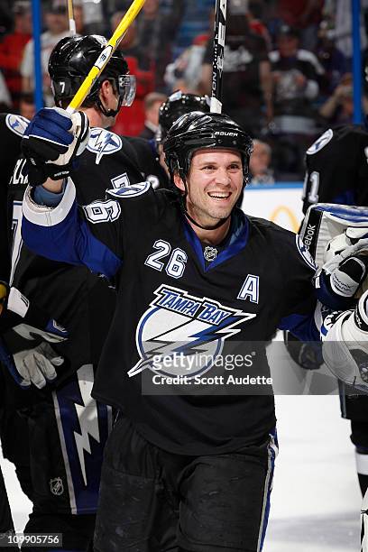 Martin St. Louis of the Tampa Bay Lightning celebrates after scoring the game-winning goal in a shootout against the Chicago Blackhawks at the St....
