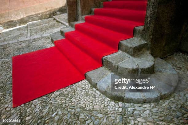 red carpet on sospel cathedral stairway. - red carpet stairs stock pictures, royalty-free photos & images