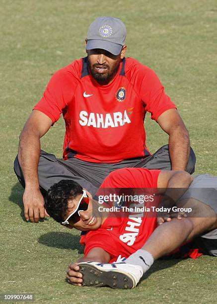 Ashish Nehra and Yusuf Pathan ahead of their match against the Netherlands at the Ferozeshah Kotla Stadium in New Delhi on Tuesday, March 08, 2011.