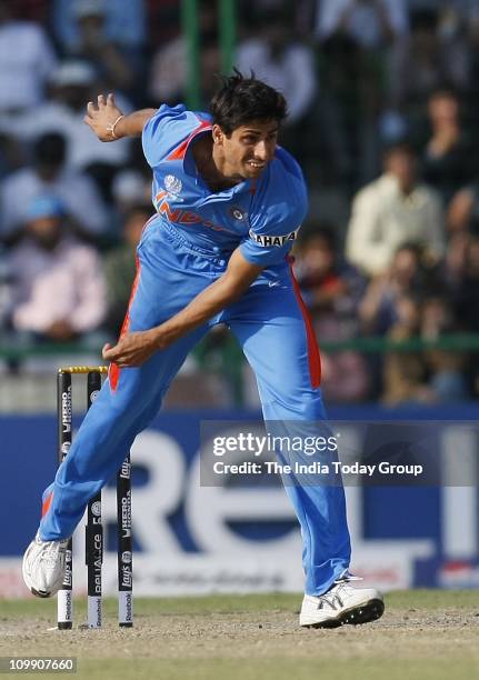 India paceman Ashish Nehra bowls during the World Cup Group B match at the Ferozeshah Kotla in New Delhi on Wednesday.