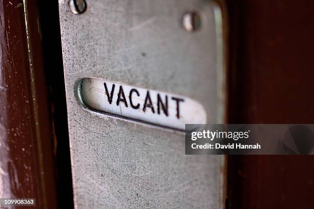 vacant toilet sign - vacant or engaged sign stock pictures, royalty-free photos & images