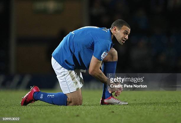 Craig Davies of Chesterfield ties his boot laces during the npower League Two match between Chesterfield and Northampton Town at the B2net Stadium on...