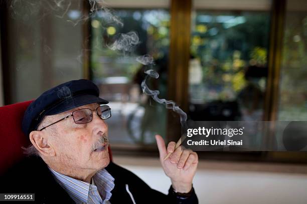 Moshe Rute smokes cannabis at the Hadarim nursing home, on March 09, 2011 in Kibutz Naan, Israel. In conjunction with Israel's Health Ministry, The...