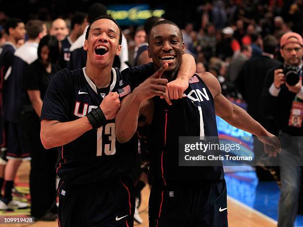 Shabazz Napier and Kemba Walker of the Connecticut Huskies celebrate after defeating the Pittsburgh Panthers during the quarterfinals of the 2011 Big...