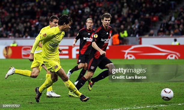 Nilmar of Villarreal scores his teams second goal during the UEFA Europa League round of 16 first leg match between Bayer Leverkusen and Villarreal...