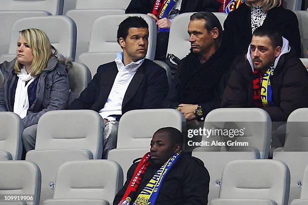 Michael Ballack of Leverkusen watches the UEFA Europa League round of 16 first leg match between Bayer Leverkusen and Villarreal from the main stand...