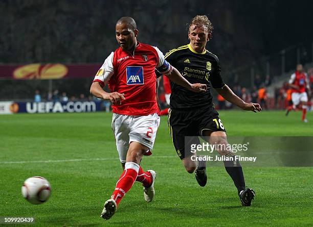 Alberto Rodriguez of Braga battles with Dirk Kuyt of Liverpool during the UEFA Europa League round of 16 first leg match between Braga and Liverpool...
