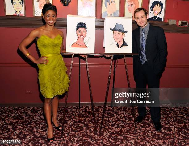 Actors Montego Glover and Chad Kimball attend their caricature unveiling for Broadway's "Memphis" at Sardi's on March 10, 2011 in New York City.