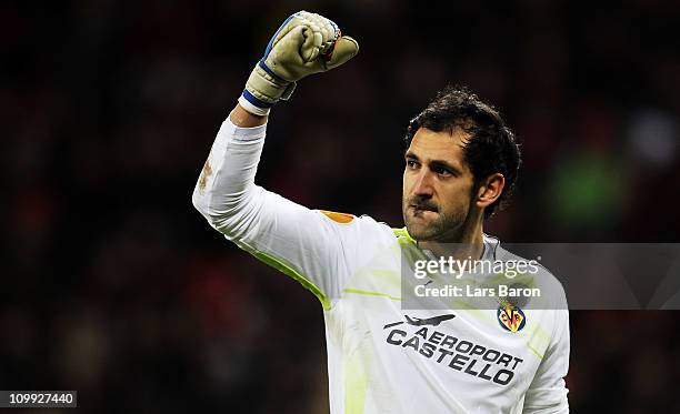 Goalkeeper Diego Lopez of Villarreal celebrates during the UEFA Europa League round of 16 first leg match between Bayer Leverkusen and Villarreal at...