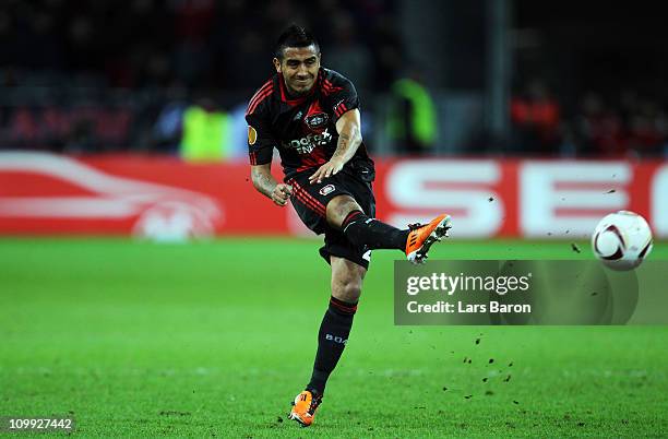 Arturo Vidal of Leverkusen shoots the ball during the UEFA Europa League round of 16 first leg match between Bayer Leverkusen and Villarreal at...