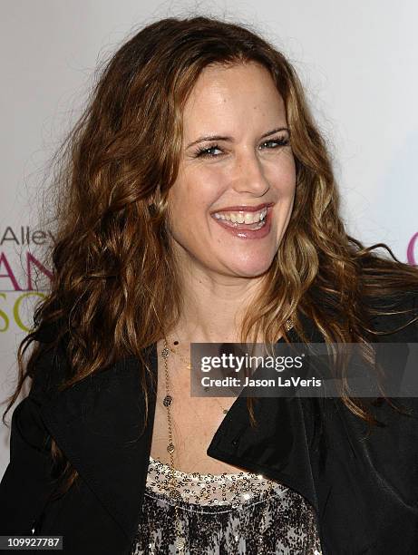 Actress Kelly Preston attends Kirstie Alley's Organic Liaison store grand opening on March 9, 2011 in Los Angeles, California.