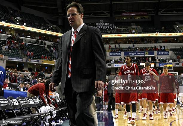 Head coach Tom Crean of the Indiana Hoosiers and his players walk off the court dejected after they lost 61-55 against the Penn State Nittany Lions...