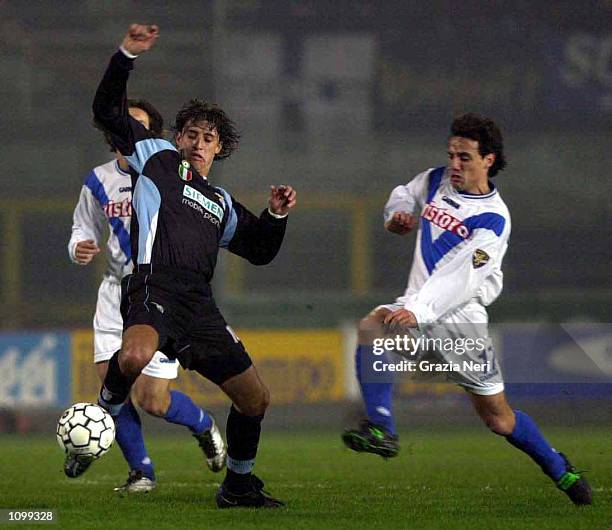 Emanuele Filippini of Brescia challenges Hernan Crespo of Lazio during the Brescia v Lazio Serie A match plaued at the Mario Rigamonti Stadium,...