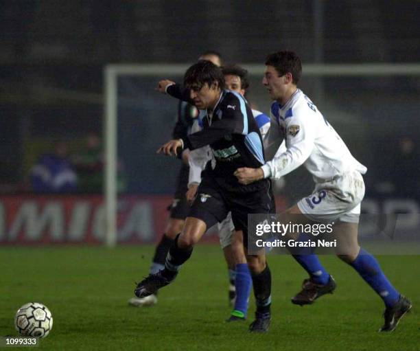 Hernan Crespo of Lazio advances under pressure from Daniele Bonera of Brescia during the Brescia v Lazio Serie A match plaued at the Mario Rigamonti...