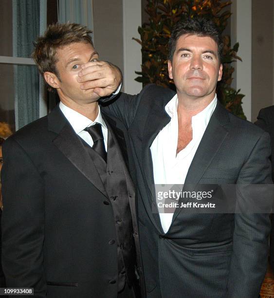 Ryan Seacrest and Simon Cowell during 55th Annual Primetime Emmy Awards - Backstage and Audience at The Shrine Auditorium in Los Angeles, California,...