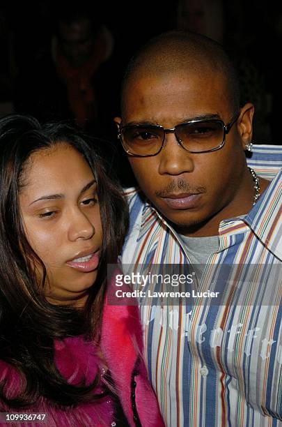 Aisha Atkins and Ja Rule during Olympus Fashion Week Fall 2004 - Luca Luca - Runway and Front Row at Bryant Park in New York City, New York, United...