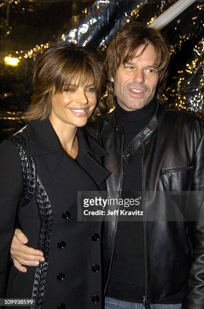 Lisa Rinna and Harry Hamlin during Cold Mountain - Los Angeles Premiere at Mann National Theater in Los Angeles, California, United States.