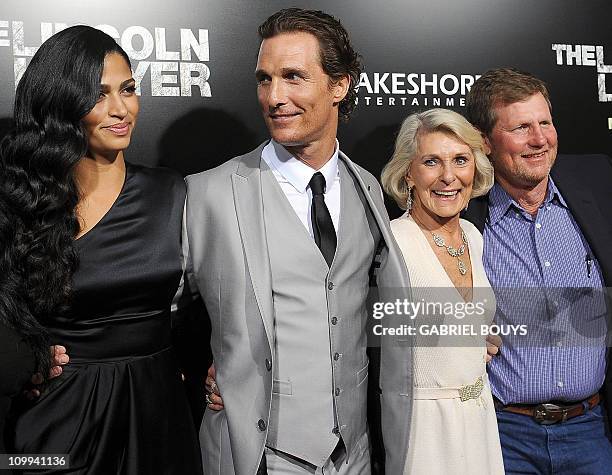 Actor Matthew McConaughey arrives with his wife Camila Alves , his mother Kay McCabeat and his brother Rooster at the premiere of "The Lincoln...