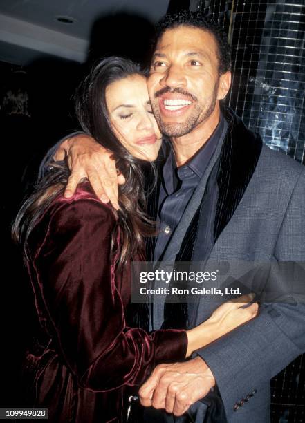 Musician Lionel Richie and Diane Alexander attend the premiere of "The Preacher's Wife" on December 9, 1996 at the Ziegfeld Theater in New York City.