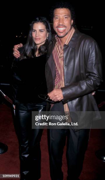 Musician Lionel Richie and Diane Alexander attend the world premiere of "Ali" on December 12, 2001 at Grauman Chinese Theater in Hollywood,...