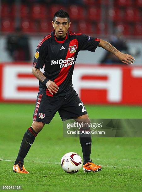 Arturo Vidal of Leverkusen runs with the ball during the UEFA Europa League round of 16 first leg match between Bayer Leverkusen and Villarreal at...