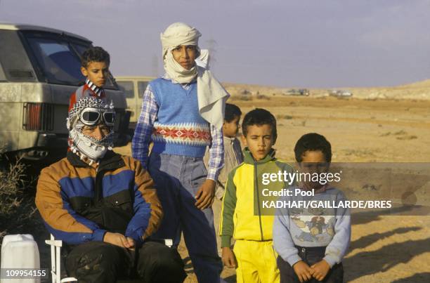 Colonel Muammar Gaddafi with his children, from left Hannibal, Saadi, Khamis and Seif al Islam, near Bab Azizia palace, destroyed in a US air raid...