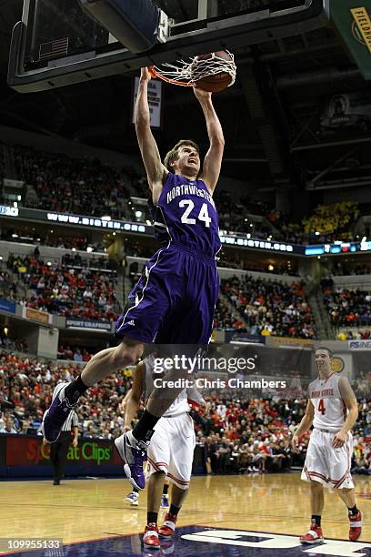 John Shurna of the Northwestern Wildcats dunks against the Ohio State Buckeyes during the quarterfinals of the 2011 Big Ten Men's Basketball...