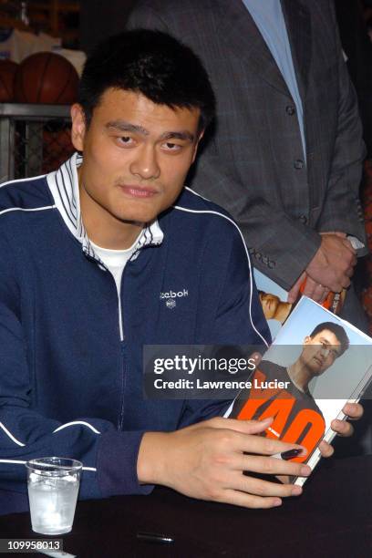 Yao Ming during Yao Ming Signs His New Book Yao: A Life in Two Worlds at NBA Store in New York City, New York, United States.