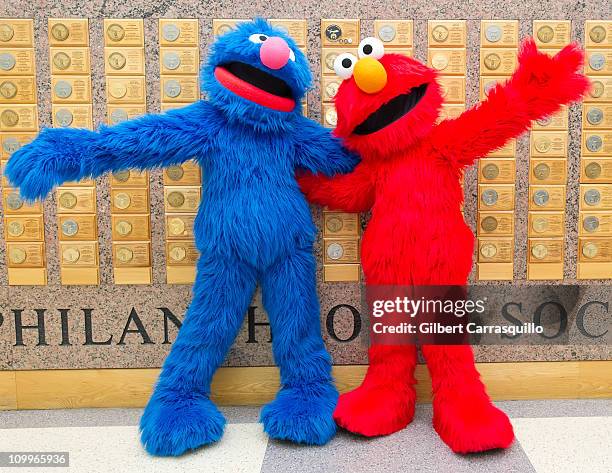 Grover and Elmo from 'Sesame Street' visit the Shriner's Hospital For Children on March 11, 2011 in Philadelphia, Pennsylvania.