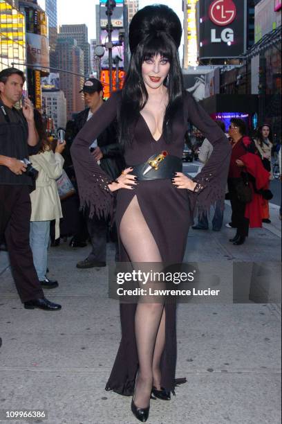 Elvira during Elvira Pays A Halloween Visit To Times Square at Times Square in New York City, New York, United States.