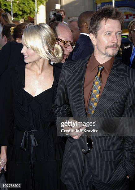 Alisa Marshall and Gary Oldman during Batman Begins Los Angeles Premiere - Arrivals at Grauman's Chinese Theater in Hollywood, California, United...