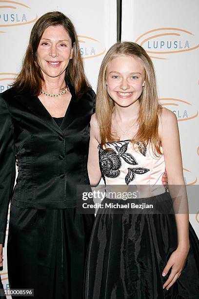 Producer Lauren Shuler Donner and actress Dakota Fanning arrive at the Lupus LA's 2008 Orange Ball on May 1, 2008 at The Beverly Wilshire in Beverly...