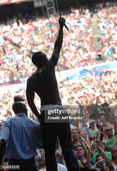 Akon Rapper Concert Rapper Akon performs onstage at Live Earth New York held at Giants ...
