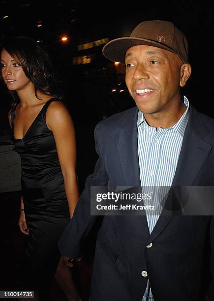 Model Denise Vasi and music mogul Russell Simmons arrive at VH1's Save The Music 10th Anniversary Gala at The Tent at Lincoln Center on September 20,...