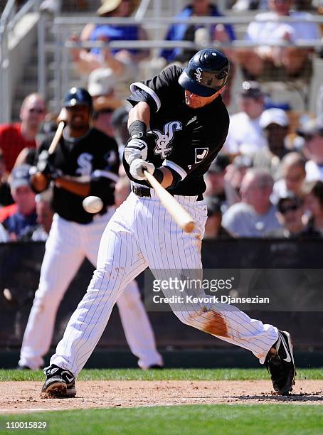 Dallas McPherson of the Chicago White Sox during the spring training baseball game against Chicago Cubs at Camelback Ranch on March 11, 2011 in...