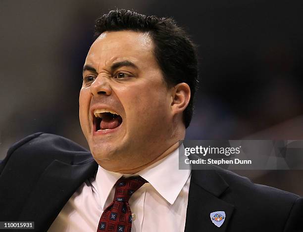 Head coach Sean Miller of the Arizona Wildcats reacts while taking on the Oregon State Beavers in the first half in the quarterfinals of the 2011...