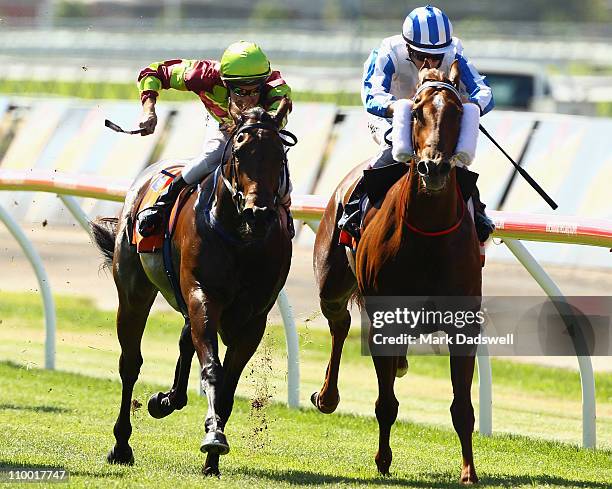 Jockey Michael Rodd riding Triple Asset wins Race One the TBV Thoroughbred Breeders Stakes from Glyn Schofield on Metonymy during Super Saturday at...