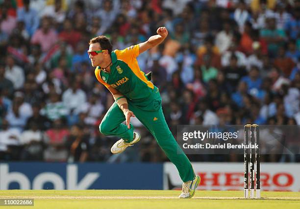 Faf du Plessis of South Africa bowls during the Group B ICC World Cup Cricket match between India and South Africa at Vidarbha Cricket Association...