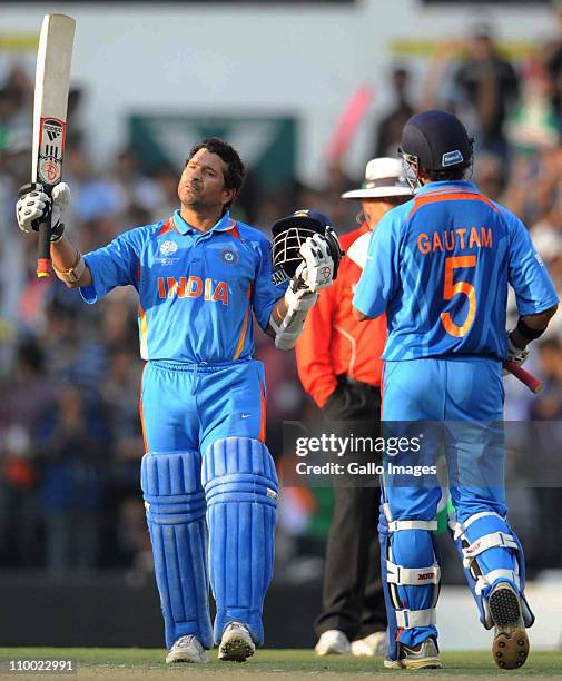 Sachin Tendulkar of India celebrates his 100 during the Group B ICC World Cup Cricket match between India and South Africa at Vidarbha Cricket...