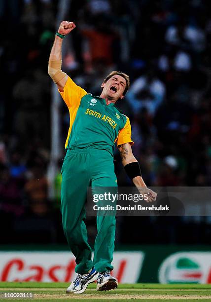 Dale Steyn of South Africa celebrates after bowling Munaf Patel of India during the Group B ICC World Cup Cricket match between India and South...