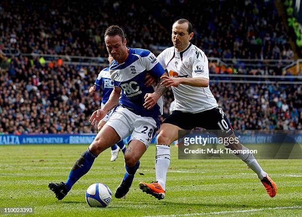 Martin Jiranek of Birmingham City fights for the ball with Martin Petrov of Bolton Wanderers during the FA Cup sponsored by E.On Sixth Round match...