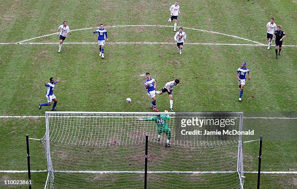 Chung-Yong Lee of Bolton Wanderers scores their third and the winning goal past Ben Foster of Birmingham City during the FA Cup sponsored by E.On...