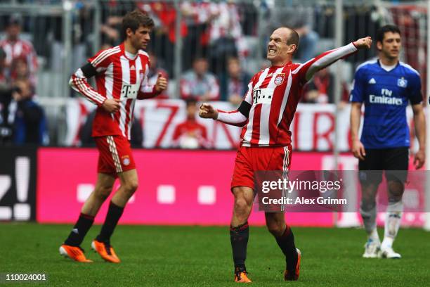 Arjen Robben of Muenchen celebrates his team's first goal during the Bundesliga match between FC Bayern Muenchen and Hamburger SV at Allianz Arena on...