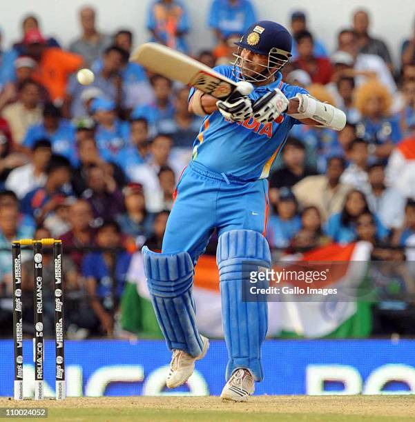 Sachin Tendulkar of India swings during the Group B ICC World Cup Cricket match between India and South Africa at Vidarbha Cricket Association Ground...