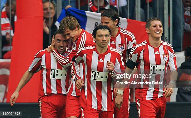 Franck Ribery of Bayern Muenchen celebrates his second goal with his teammates Holger Badstuber, Danijel Pranjic, Daniel van Buyten and Bastian...