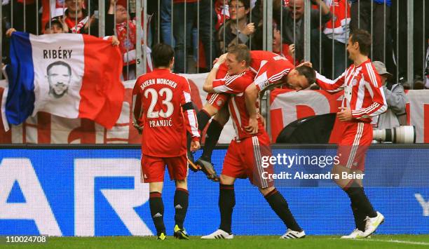 Franck Ribery of Bayern Muenchen celebrates his second goal with his teammates Danijel Pranjic, Bastian Schweinsteiger and Miroslav Klose during the...