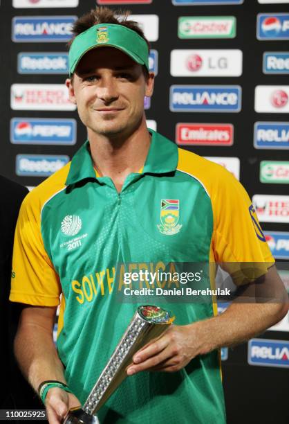 Dale Steyn of South Africa holds the man of the match trophy during the Group B ICC World Cup Cricket match between India and South Africa at...